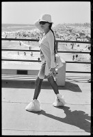 https://www.ed-templeton.com/files/gimgs/th-153_WOman with plastic bags over shoes HB pier V2.jpg